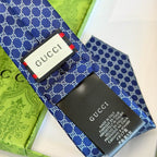 GRAVATA GUCCI  DE JACQUARD DE SEDA COM PADRÃO MINI GG