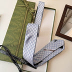 GRAVATA GUCCI  DE JACQUARD DE SEDA COM PADRÃO GG
