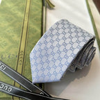GRAVATA GUCCI  DE JACQUARD DE SEDA COM PADRÃO GG
