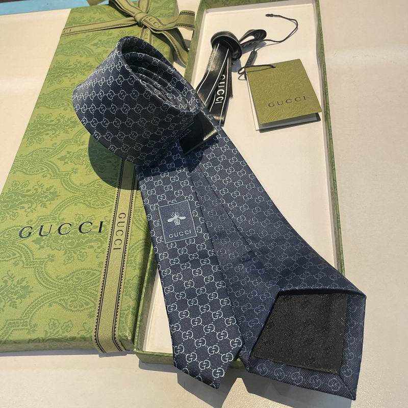 GRAVATA GUCCI DE SEDA COM ESTAMPA DOUBLE G