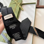 GRAVATA GUCCI  DE JACQUARD DE SEDA COM PADRÃO GG