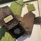 GRAVATA GUCCI DE SEDA COM ESTAMPA DOUBLE G