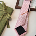 GRAVATA GUCCI  DE JACQUARD DE SEDA COM PADRÃO GG