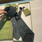 GRAVATA GUCCI DE SEDA COM ESTAMPA DOUBLE G