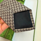 GRAVATA GUCCI GG EM JACQUART DE SEDA