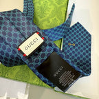 GRAVATA GUCCI  DE JACQUARD DE SEDA COM PADRÃO MINI GG
