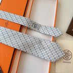 GRAVATAS HERMES  DE SEDA  OUT OF THE BOX  CAVALO, FERRADURA E ESTRIBO