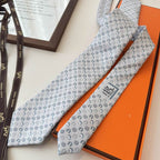 GRAVATAS HERMES  DE SEDA  OUT OF THE BOX  CAVALO, FERRADURA E ESTRIBO