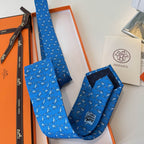 GRAVATA HERMES SARJA DE SEDA PUPPY DREAM  "SONHO DE FILHOTE"